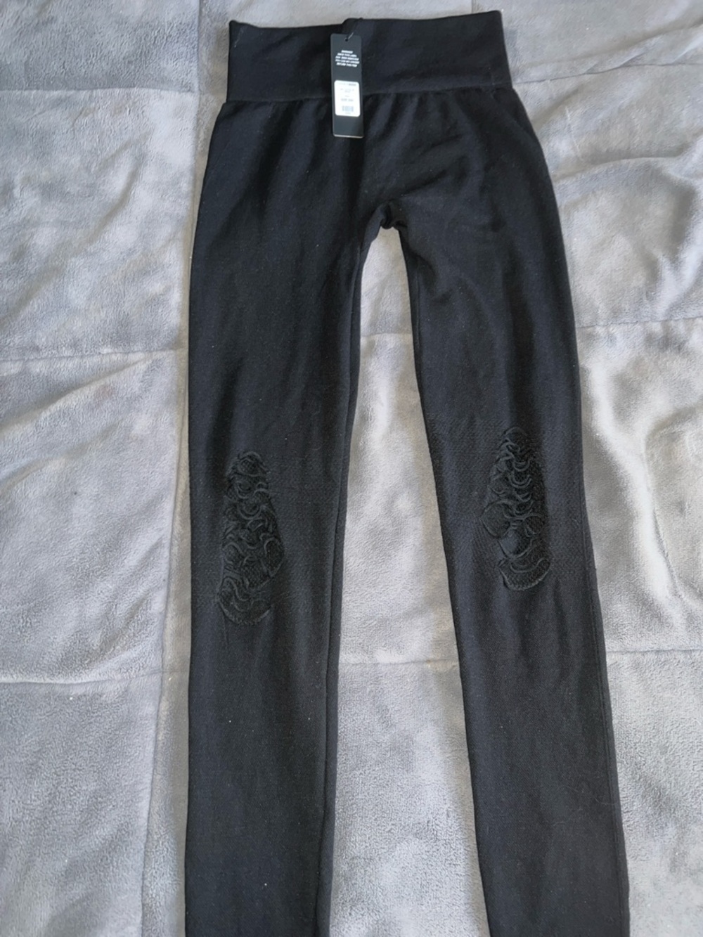 Black High-Waist Women's Leggings with knees cutout.